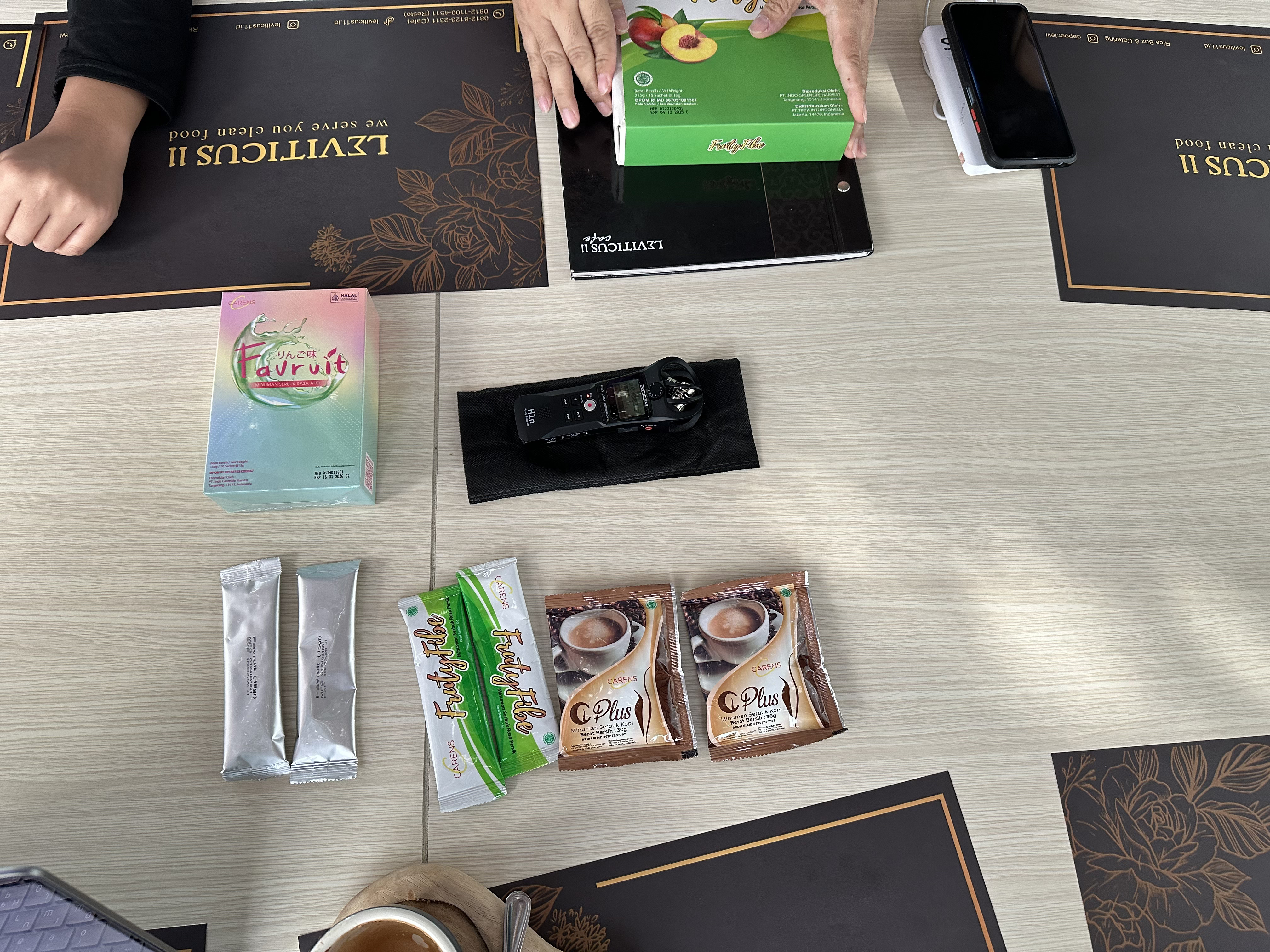 Research participants showing products during interviews in Jakarta